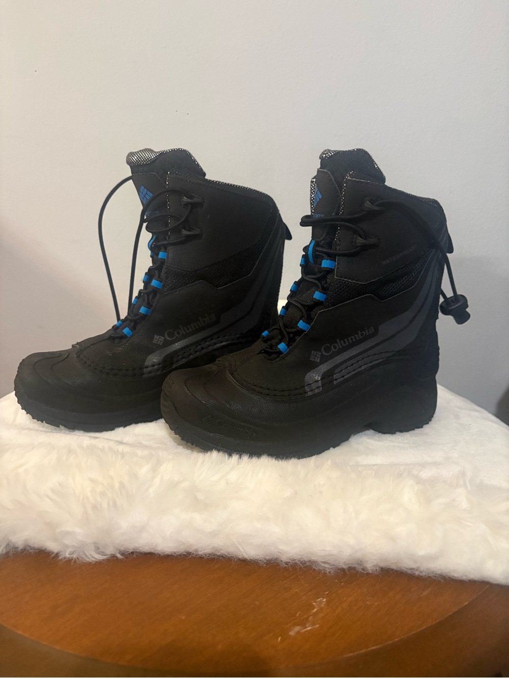 Columbia Kids Black Snow Boots with Blue Accents